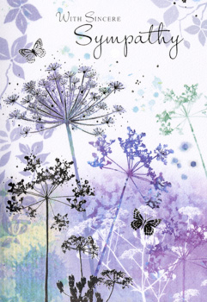 The design of this sympathy card offers a peaceful, almost meditative landscape, reminiscent of a calm, open stretch near the edges of North Ockendon. Fine, willowy stems carry umbelliferous flower heads that arch and lean in different directions, sketched in delicate strokes of violet, dusky lavender, and blue-grey. The flower clusters are detailed yet light, resembling tiny sprays of Queen Anne's lace silhouetted against a fading sky, their edges soft enough to blend with the air around them. The background is a layered wash of powdery purples, cool blues, and hints of silvery green, merged the way twilight colours seep together over the fields just beyond the village. Subtle butterflies drift among the blossoms, their shapes faint but intentional, like small emissaries of hope floating through a moment of sorrow. There is no sharp contrast or bright accent; every element is designed to ease the eye and quiet the mind, echoing the calm one might feel walking slowly along local country roads in reflective silence. The light appears gentle and encompassing, softening every outline and giving the whole composition a veil of tenderness. For families and friends in North Ockendon choosing a card to accompany funeral flowers or a sympathy arrangement, this image feels like an invitation to pause and breathe. It embodies the same thoughtful care we bring to each condolence bouquet-respectful, understated, and quietly reassuring, acknowledging loss while holding space for cherished memories to remain.